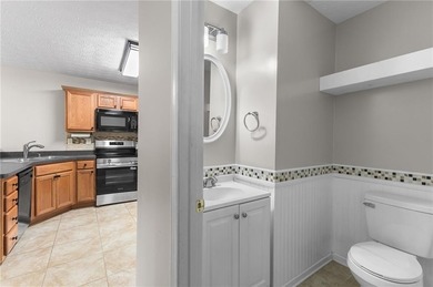 Welcome to a beautifully updated 3-bedroom, 2.5 bath home that on Canongate On White Oak Golf Course in Georgia - for sale on GolfHomes.com, golf home, golf lot