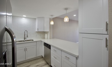 Beautifully remodeled 3-bedroom, 2-bath, two-story townhome! on Fountain of the Sun Country Club in Arizona - for sale on GolfHomes.com, golf home, golf lot