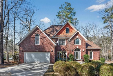 A rare lakefront offering in exclusive Reynolds Landing on Reynolds Lake Oconee - The Landing in Georgia - for sale on GolfHomes.com, golf home, golf lot