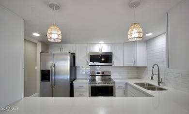 Beautifully remodeled 3-bedroom, 2-bath, two-story townhome! on Fountain of the Sun Country Club in Arizona - for sale on GolfHomes.com, golf home, golf lot