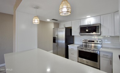 Beautifully remodeled 3-bedroom, 2-bath, two-story townhome! on Fountain of the Sun Country Club in Arizona - for sale on GolfHomes.com, golf home, golf lot