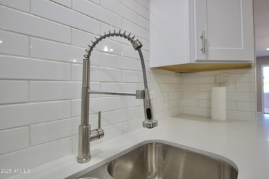 Beautifully remodeled 3-bedroom, 2-bath, two-story townhome! on Fountain of the Sun Country Club in Arizona - for sale on GolfHomes.com, golf home, golf lot