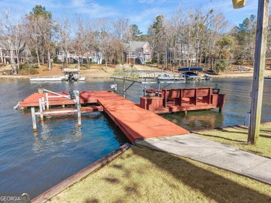 A rare lakefront offering in exclusive Reynolds Landing on Reynolds Lake Oconee - The Landing in Georgia - for sale on GolfHomes.com, golf home, golf lot