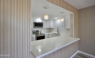 Beautifully remodeled 3-bedroom, 2-bath, two-story townhome! on Fountain of the Sun Country Club in Arizona - for sale on GolfHomes.com, golf home, golf lot