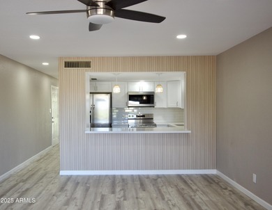 Beautifully remodeled 3-bedroom, 2-bath, two-story townhome! on Fountain of the Sun Country Club in Arizona - for sale on GolfHomes.com, golf home, golf lot