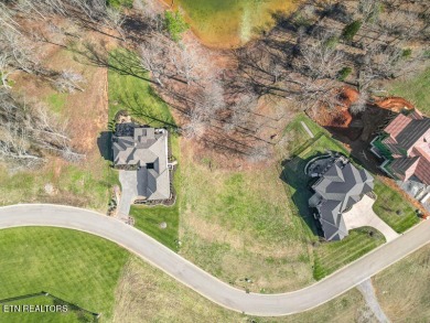 Embrace the luxury of lakeside living in WindRiver, a gorgeous on Wind River Golf Course in Tennessee - for sale on GolfHomes.com, golf home, golf lot