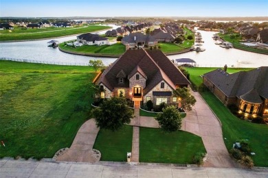 Stunning one story custom home that sits on the canal in The on The Golf Club at Resort Eagle Mountain Lake in Texas - for sale on GolfHomes.com, golf home, golf lot