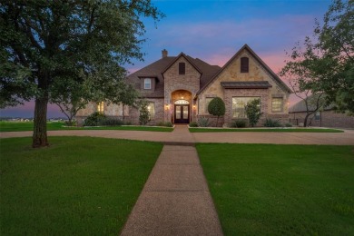 Stunning one story custom home that sits on the canal in The on The Golf Club at Resort Eagle Mountain Lake in Texas - for sale on GolfHomes.com, golf home, golf lot