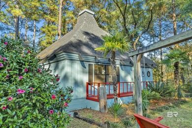 Welcome to your peaceful cottage in the woods, a private oasis on Lake Forest Yacht and Country Club in Alabama - for sale on GolfHomes.com, golf home, golf lot