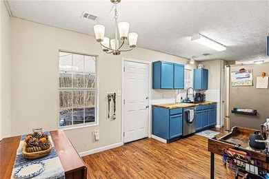 Charming ranch home in sought-after Turtle Cove! This on Turtle Cove Golf Course in Georgia - for sale on GolfHomes.com, golf home, golf lot