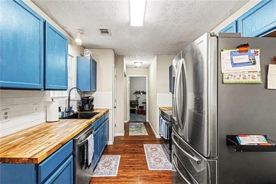 Charming ranch home in sought-after Turtle Cove! This on Turtle Cove Golf Course in Georgia - for sale on GolfHomes.com, golf home, golf lot