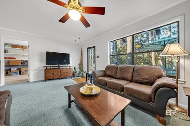 Welcome to your peaceful cottage in the woods, a private oasis on Lake Forest Yacht and Country Club in Alabama - for sale on GolfHomes.com, golf home, golf lot