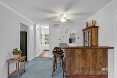 Welcome to your peaceful cottage in the woods, a private oasis on Lake Forest Yacht and Country Club in Alabama - for sale on GolfHomes.com, golf home, golf lot