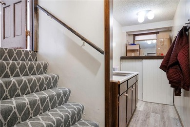 This spacious 4-bedroom residence offers exceptionally large on National Golf Club of Kansas City in Missouri - for sale on GolfHomes.com, golf home, golf lot