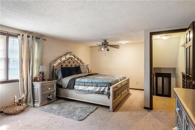 This spacious 4-bedroom residence offers exceptionally large on National Golf Club of Kansas City in Missouri - for sale on GolfHomes.com, golf home, golf lot