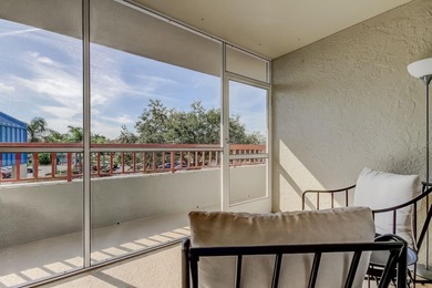 Discover this light-filled and spacious end-unit condo in the on Feather Sound Country Club in Florida - for sale on GolfHomes.com, golf home, golf lot