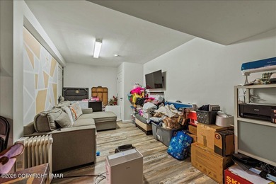 Welcome to 102 Tulip Trail, nestled in the sought-after Pocono on Pocono Farms Country Club in Pennsylvania - for sale on GolfHomes.com, golf home, golf lot