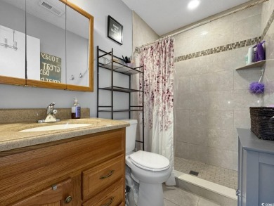 Welcome to this well-maintained 2-bedroom, 2-bath end unit on Heron Point Golf Club in South Carolina - for sale on GolfHomes.com, golf home, golf lot