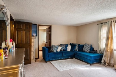 This spacious 4-bedroom residence offers exceptionally large on National Golf Club of Kansas City in Missouri - for sale on GolfHomes.com, golf home, golf lot