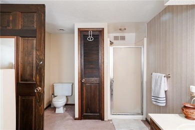 This spacious 4-bedroom residence offers exceptionally large on National Golf Club of Kansas City in Missouri - for sale on GolfHomes.com, golf home, golf lot