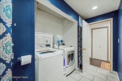 Welcome to 102 Tulip Trail, nestled in the sought-after Pocono on Pocono Farms Country Club in Pennsylvania - for sale on GolfHomes.com, golf home, golf lot