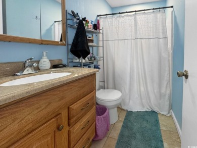 Welcome to this well-maintained 2-bedroom, 2-bath end unit on Heron Point Golf Club in South Carolina - for sale on GolfHomes.com, golf home, golf lot