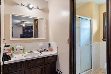 This spacious 4-bedroom residence offers exceptionally large on National Golf Club of Kansas City in Missouri - for sale on GolfHomes.com, golf home, golf lot