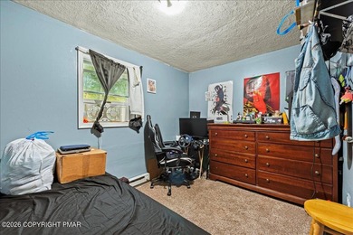 Welcome to 102 Tulip Trail, nestled in the sought-after Pocono on Pocono Farms Country Club in Pennsylvania - for sale on GolfHomes.com, golf home, golf lot