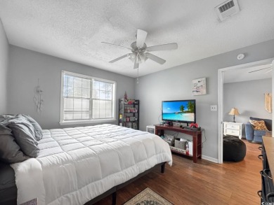 Welcome to this well-maintained 2-bedroom, 2-bath end unit on Heron Point Golf Club in South Carolina - for sale on GolfHomes.com, golf home, golf lot