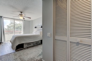 Discover this light-filled and spacious end-unit condo in the on Feather Sound Country Club in Florida - for sale on GolfHomes.com, golf home, golf lot