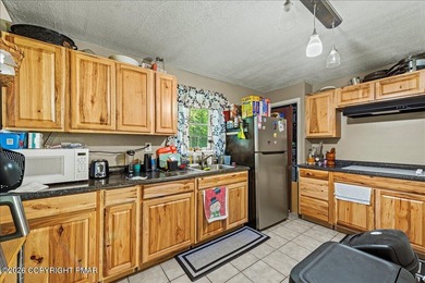 Welcome to 102 Tulip Trail, nestled in the sought-after Pocono on Pocono Farms Country Club in Pennsylvania - for sale on GolfHomes.com, golf home, golf lot