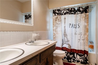 This spacious 4-bedroom residence offers exceptionally large on National Golf Club of Kansas City in Missouri - for sale on GolfHomes.com, golf home, golf lot