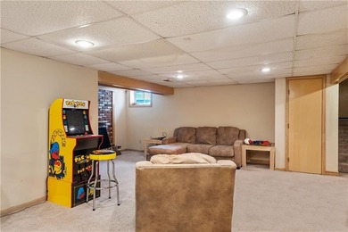 This spacious 4-bedroom residence offers exceptionally large on National Golf Club of Kansas City in Missouri - for sale on GolfHomes.com, golf home, golf lot