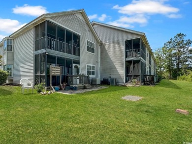Welcome to this well-maintained 2-bedroom, 2-bath end unit on Heron Point Golf Club in South Carolina - for sale on GolfHomes.com, golf home, golf lot