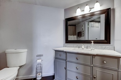 Discover this light-filled and spacious end-unit condo in the on Feather Sound Country Club in Florida - for sale on GolfHomes.com, golf home, golf lot