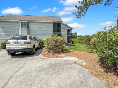 Welcome to this well-maintained 2-bedroom, 2-bath end unit on Heron Point Golf Club in South Carolina - for sale on GolfHomes.com, golf home, golf lot