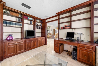 Nestled on a quiet cul-de-sac in the desirable Boca Woods on Boca Woods Country Club in Florida - for sale on GolfHomes.com, golf home, golf lot