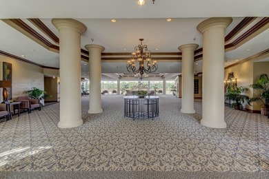 Discover this light-filled and spacious end-unit condo in the on Feather Sound Country Club in Florida - for sale on GolfHomes.com, golf home, golf lot