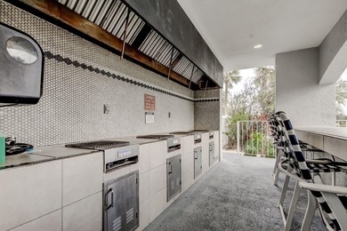 Discover this light-filled and spacious end-unit condo in the on Feather Sound Country Club in Florida - for sale on GolfHomes.com, golf home, golf lot