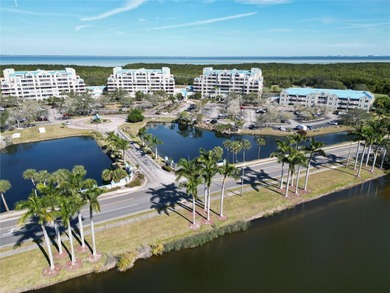 Discover this light-filled and spacious end-unit condo in the on Feather Sound Country Club in Florida - for sale on GolfHomes.com, golf home, golf lot