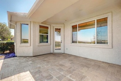 Step into this beautifully refreshed LaCosta model, where on Wildhorse Golf Club of Robson Ranch in Texas - for sale on GolfHomes.com, golf home, golf lot