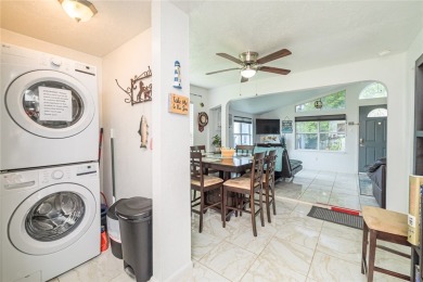 Charming and fully furnished 2-bedroom, 1-bath Cottage with a on Rockport Country Club in Texas - for sale on GolfHomes.com, golf home, golf lot