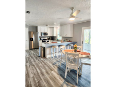 If you've been searching for a beautifully updated home in sunny on Lake Fairways Country Club in Florida - for sale on GolfHomes.com, golf home, golf lot