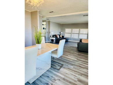 If you've been searching for a beautifully updated home in sunny on Lake Fairways Country Club in Florida - for sale on GolfHomes.com, golf home, golf lot