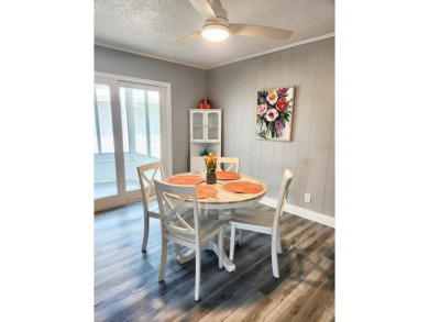 If you've been searching for a beautifully updated home in sunny on Lake Fairways Country Club in Florida - for sale on GolfHomes.com, golf home, golf lot