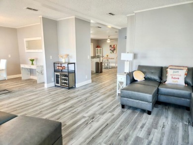 If you've been searching for a beautifully updated home in sunny on Lake Fairways Country Club in Florida - for sale on GolfHomes.com, golf home, golf lot