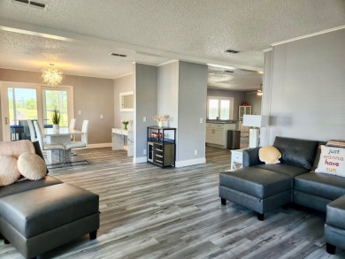 If you've been searching for a beautifully updated home in sunny on Lake Fairways Country Club in Florida - for sale on GolfHomes.com, golf home, golf lot