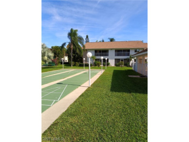 Rarely available ground floor end unit within walking distance on Copperhead Golf Club in Florida - for sale on GolfHomes.com, golf home, golf lot