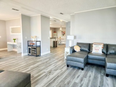 If you've been searching for a beautifully updated home in sunny on Lake Fairways Country Club in Florida - for sale on GolfHomes.com, golf home, golf lot