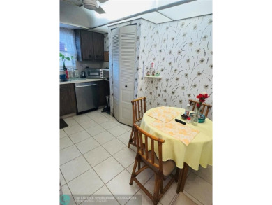 This charming two-bedroom, two-bath condo offers a cozy retreat on Sunrise Lakes Phase III in Florida - for sale on GolfHomes.com, golf home, golf lot